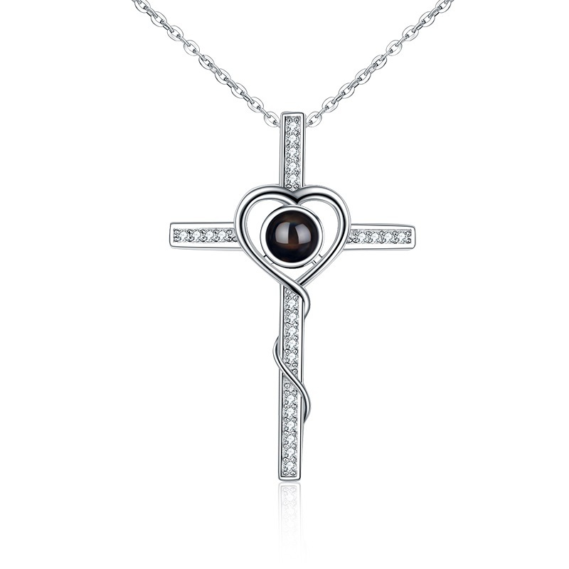 Close view of the real Angel Cross projection lens that holds a hidden message